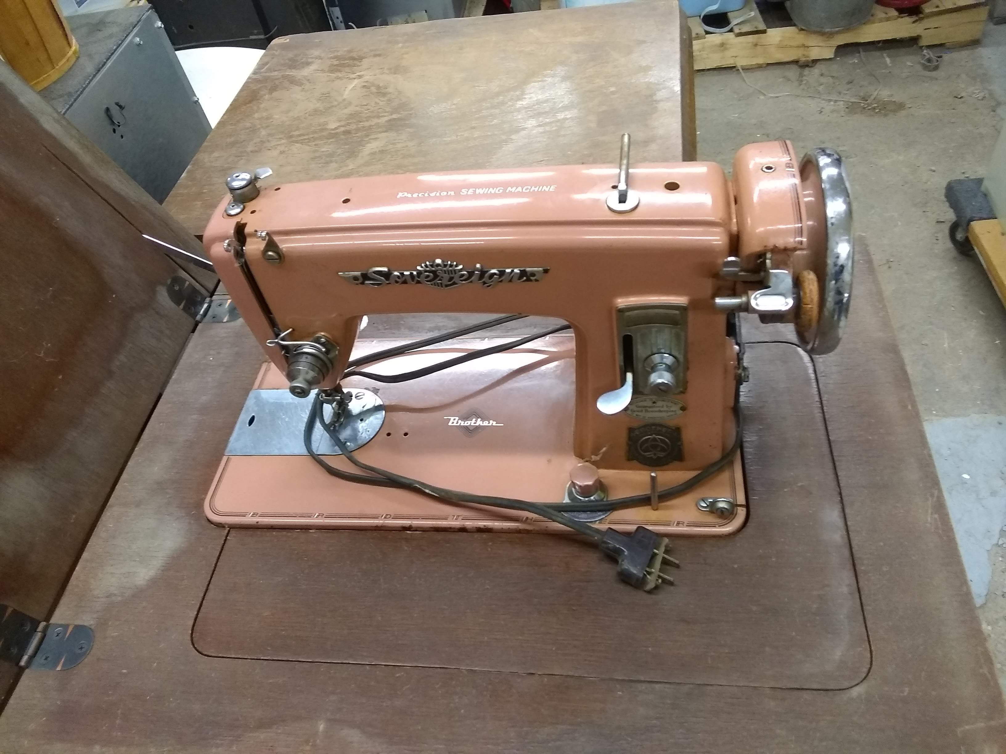 Sewing machine in cabinet, Brother